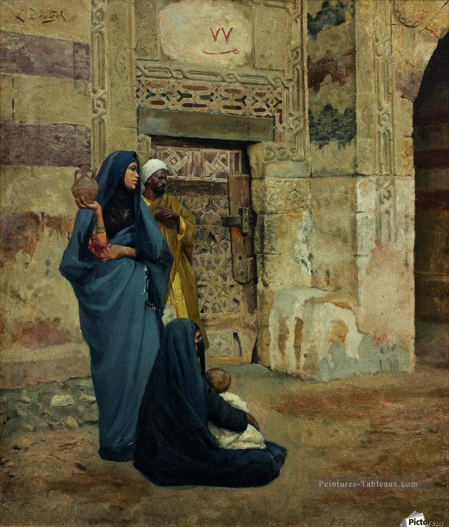 Une famille à la porte près de l’entrée Ludwig Deutsch Orientalism Peintures à l'huile